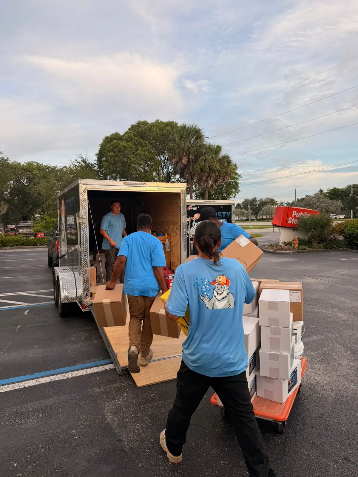 Unloading materials from the van on site