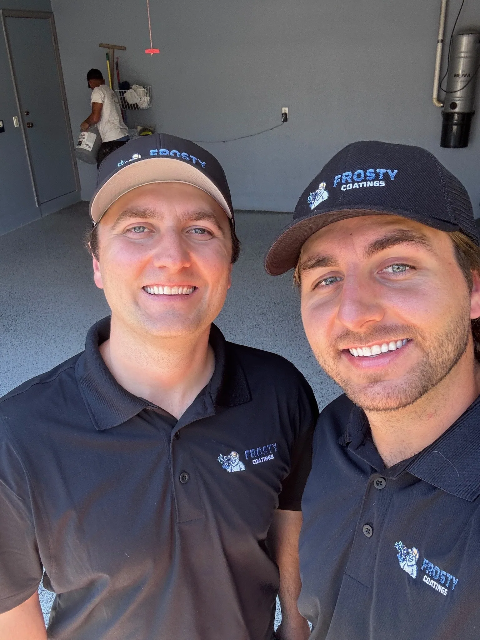 Steve and Ed, the founders of Frosty Coatings LLC, on a finished floor